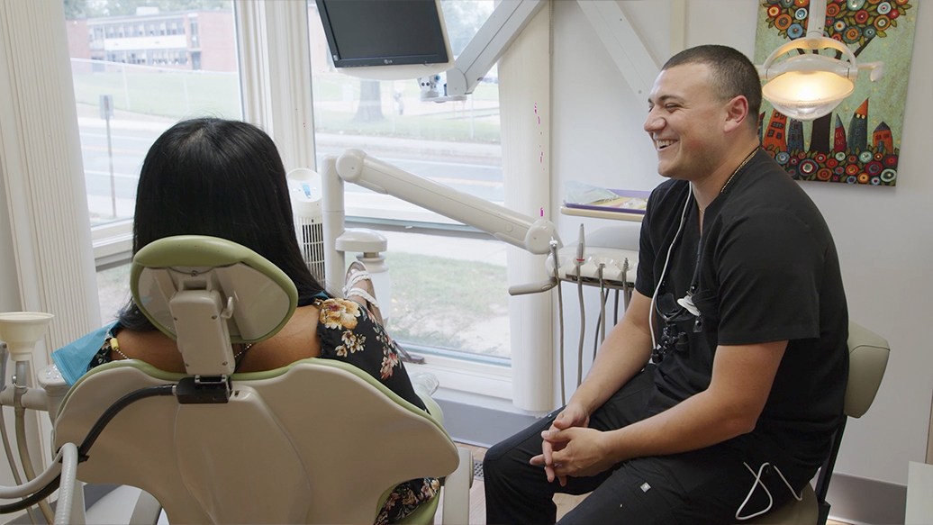 Mount Holly dentist laughing with a patient