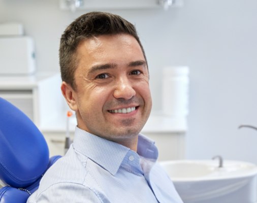 Man smiling after laser dentistry treatment