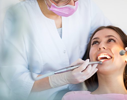 Dentist treating dental  patient