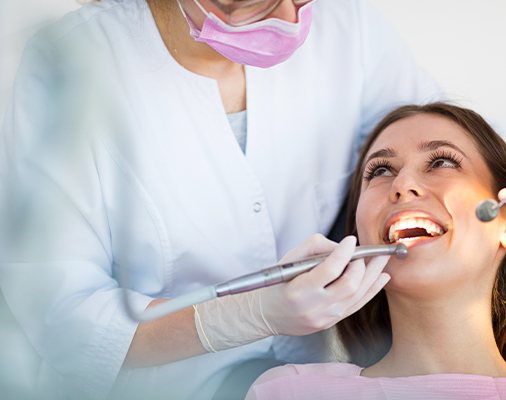Dentist treating dental patient