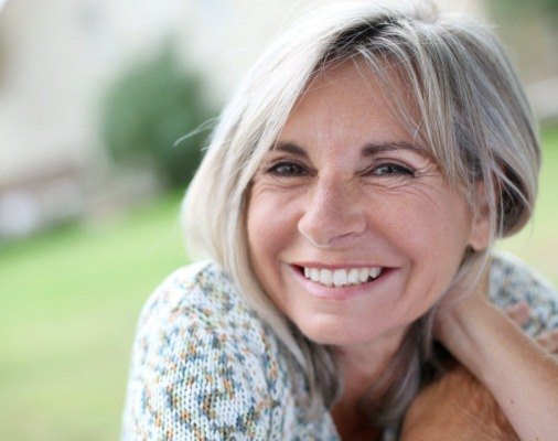 Woman with gorgeous smile after makeover