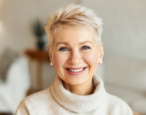 Woman with dentures smiling