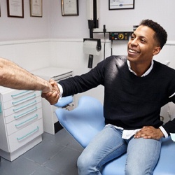 man shaking hands with his emergency dentist in Mt. Holly