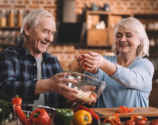 Couple cooking together in Mt. Holly