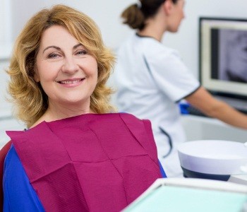 Woman with dental implants smiling