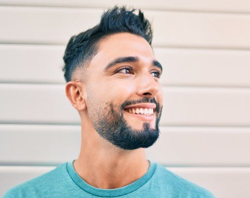 Man sharing smile after makeover