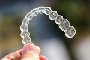 Looking at these aligners, do you wonder "Does Invisalign hurt?"
