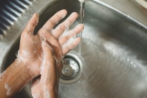 person washing hands