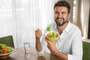 man eating healthy food