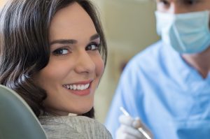 woman smiling happy dental visit 