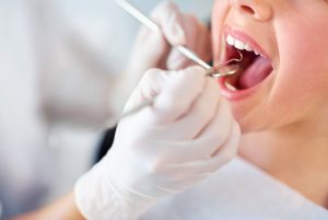 Periodontal disease in Mt. Holly features red, puffy, pus-filled gums that pull away from teeth. Learn how deep cleanings help this oral health problem.